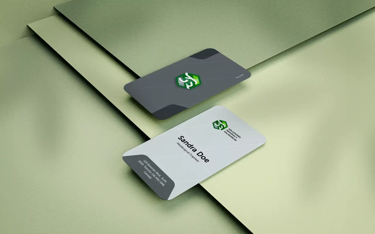 Tarjetas de visita de 3S Soluciones sobre fondo verde