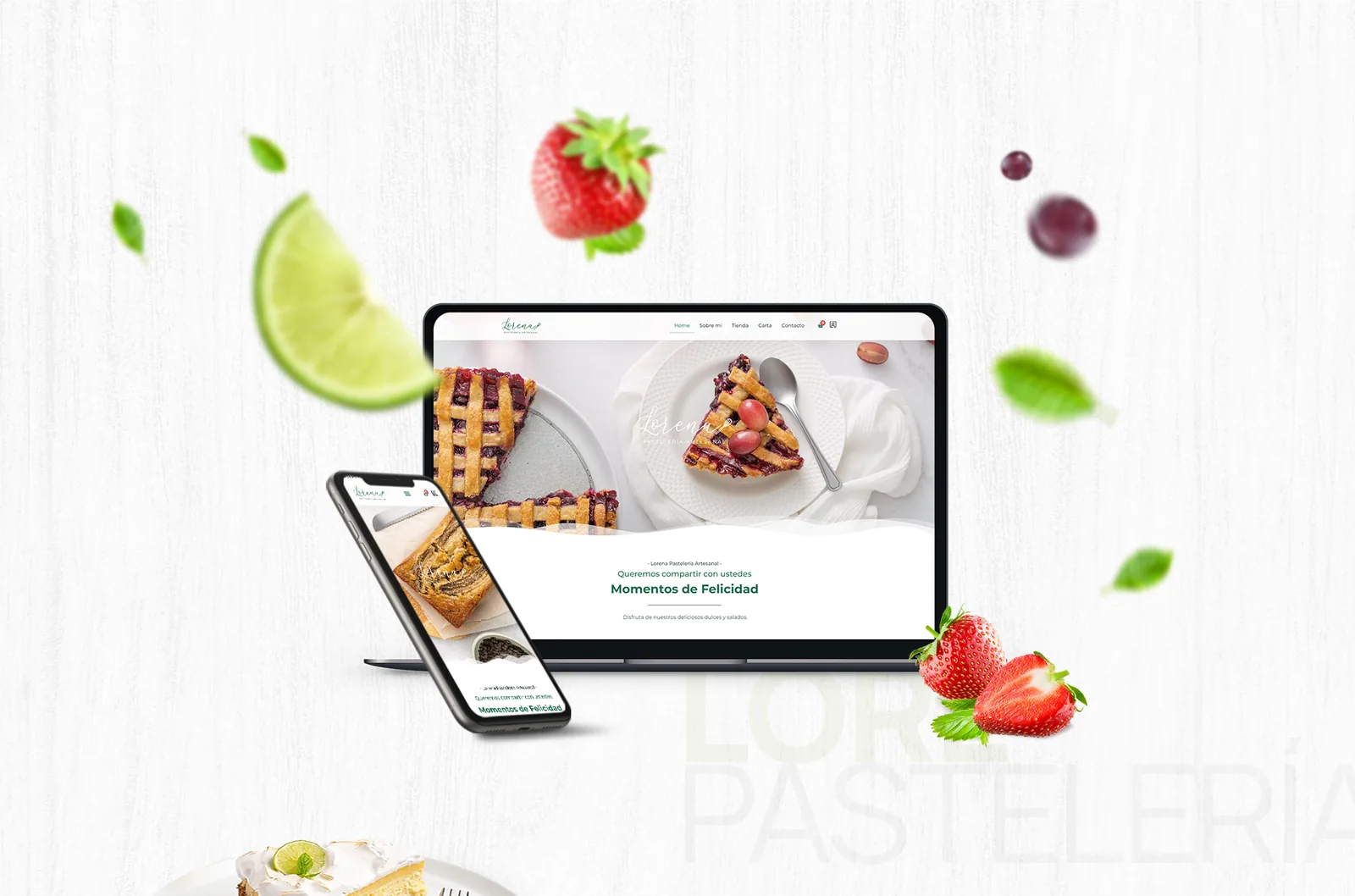 Tienda online de Pastelería Lore en una tablet y un móvil entre fresas y hojas